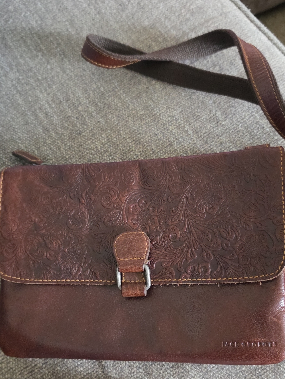 Tooled Floral Brown Leather Crossbody Bag with Buckle Accent